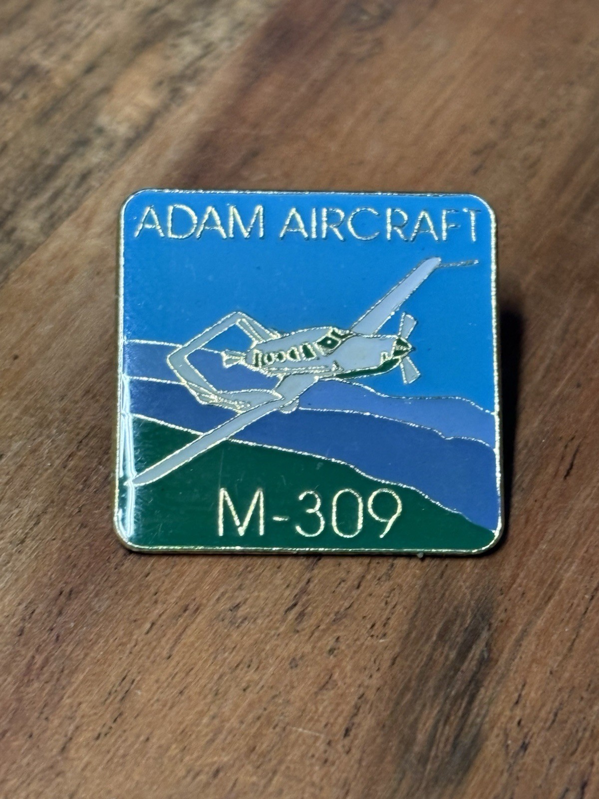 Adam Aircraft Industries M-309 Airplane Souvenir Collector Pin Adam Aircraft Industries M-309 Airplane Souvenir Collector Pin