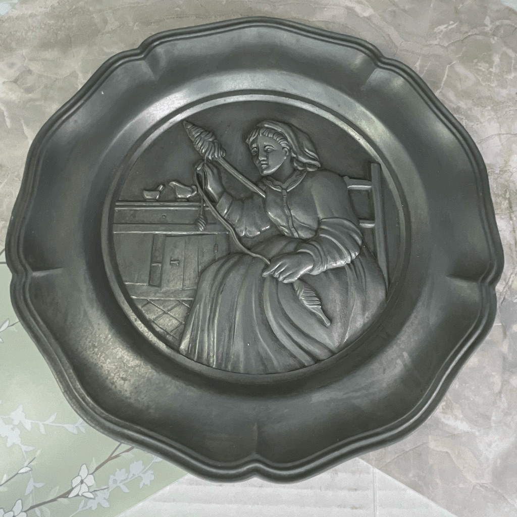 Vintage Cheswick PA action industries high relief pewter. Woman spinning yarn. Vintage Cheswick PA action industries high relief pewter. Woman spinning yarn.