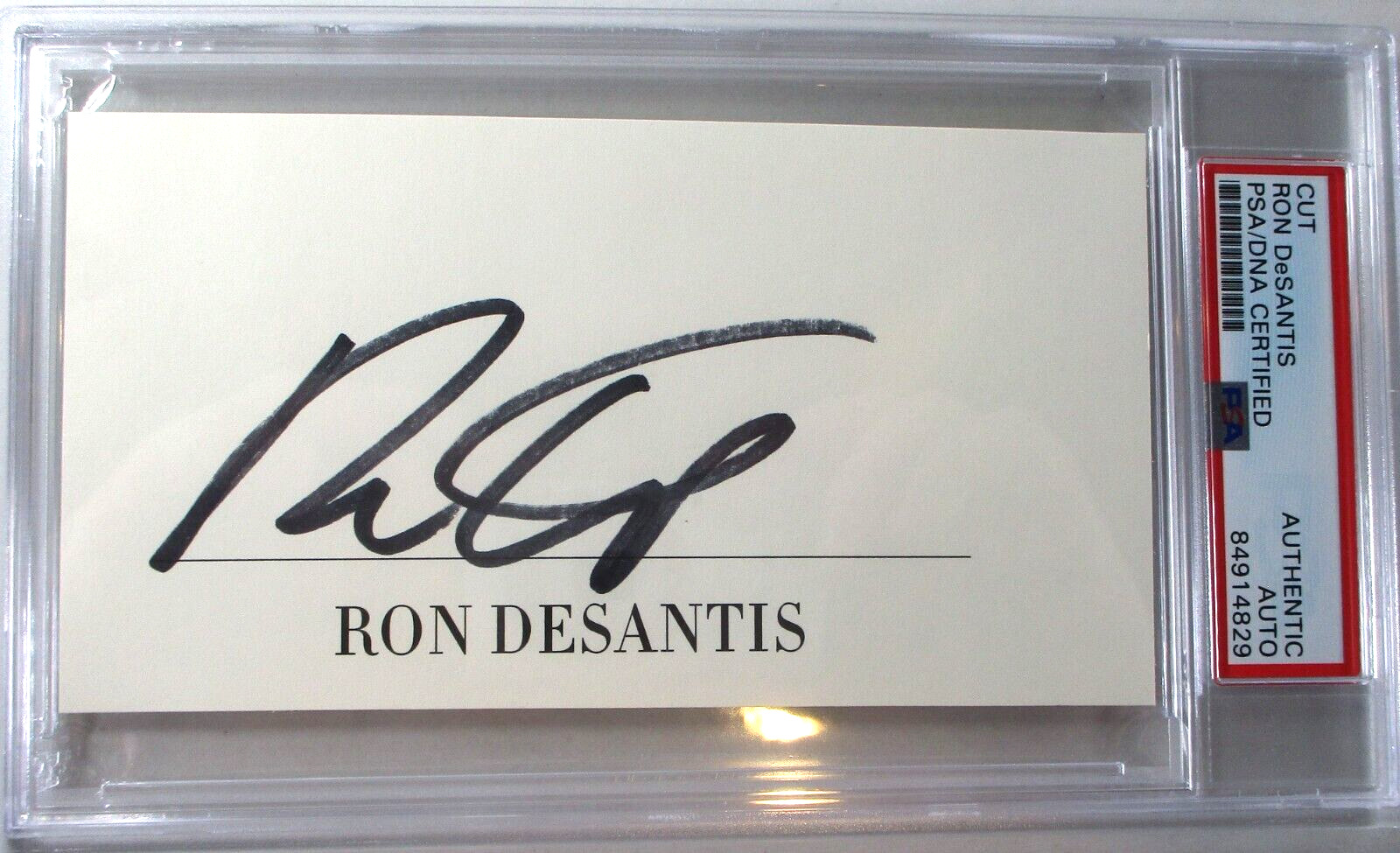 Governor Ron DeSantis / Autographed Cut - PSA/DNA Slabbed and Certified