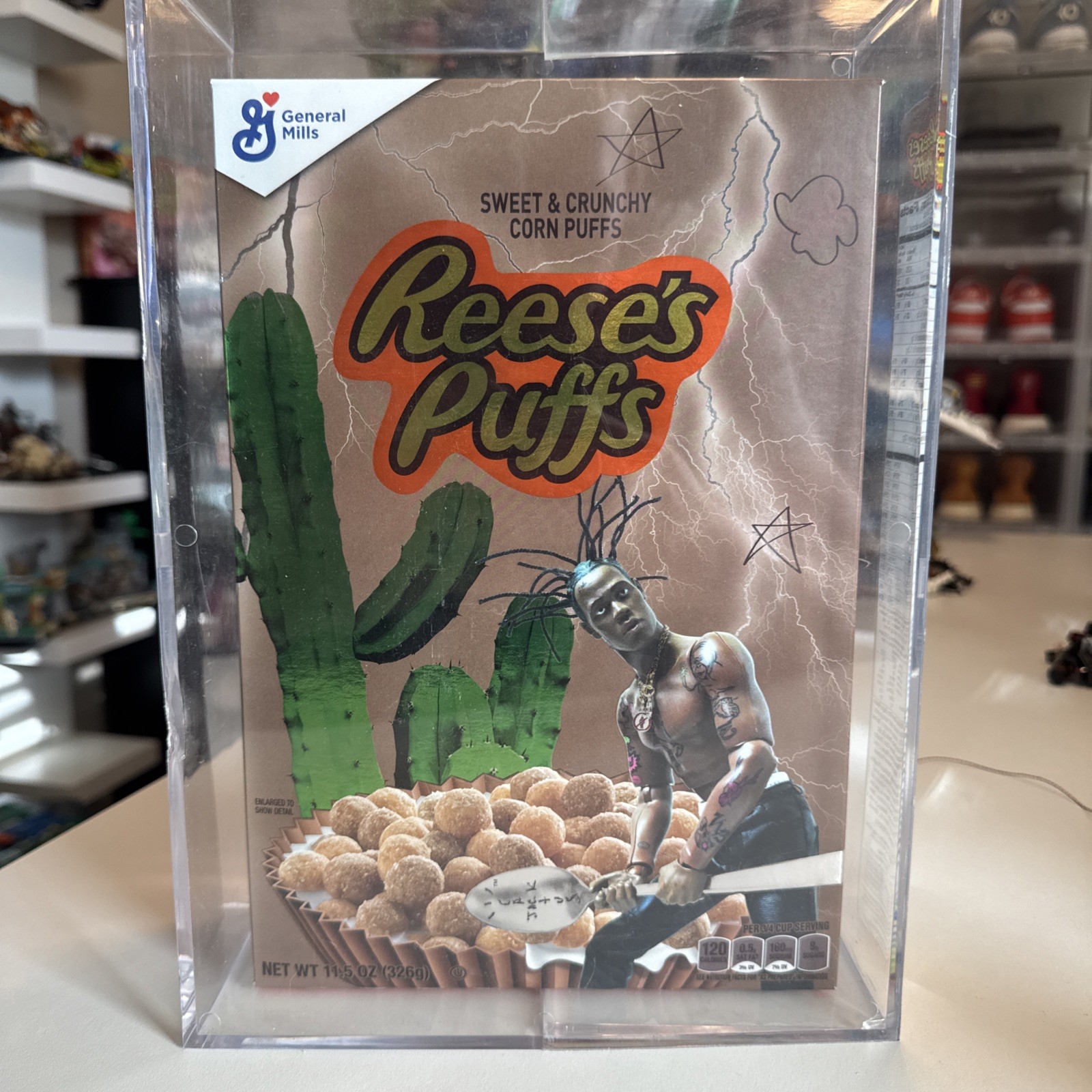 Travis Scott x Reeses Puffs Cereal Box Rare Limited Edition in Acrylic Case Travis Scott x Reeses Puffs Cereal Box Rare Limited Edition in Acrylic Case