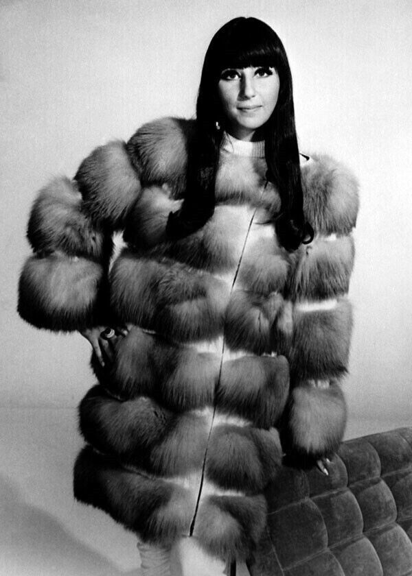 Cher classic 1960\'s pose in fur coat and boots 5x7 inch press photo