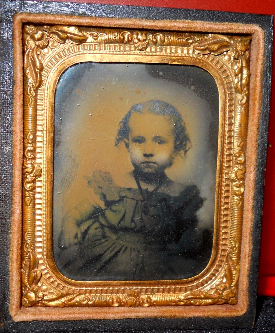 1/9th size Ambrotype of young child in half case
