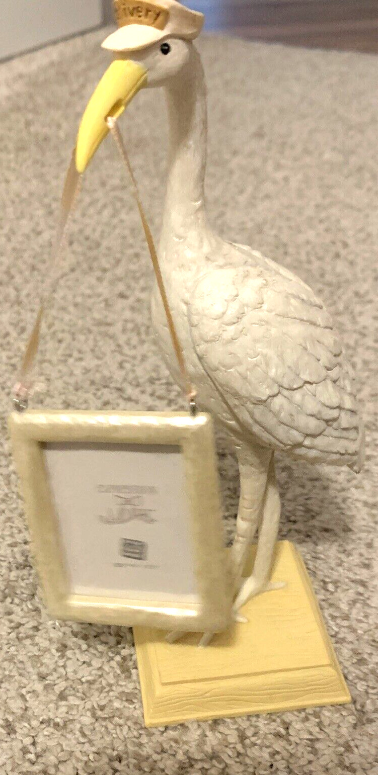 Russ Baby Hand painted Vintage stork with Frame never used, but out of box.
