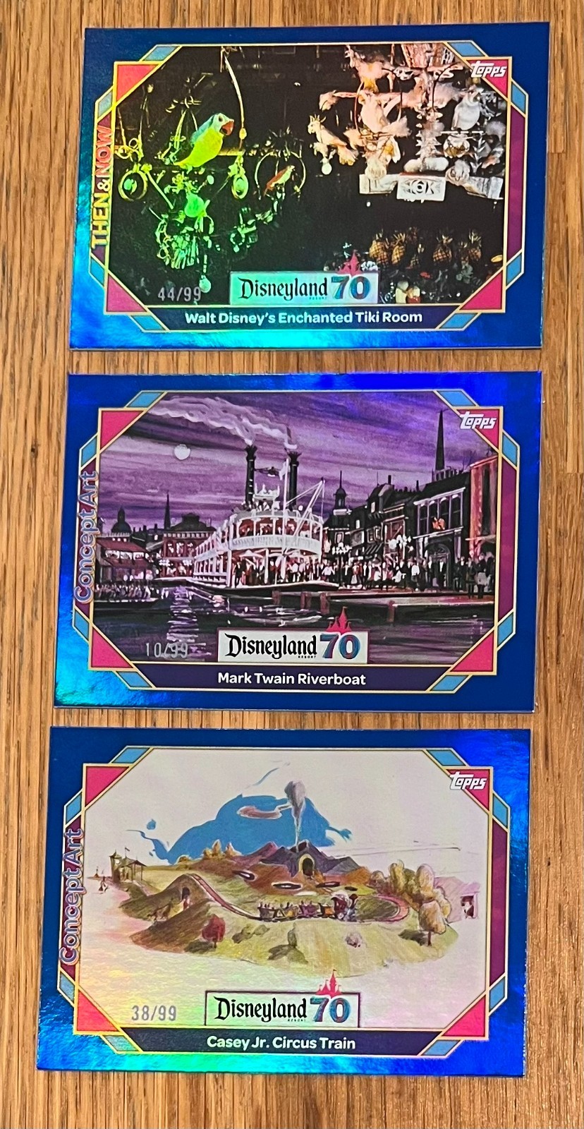 2025 TOPPS Disneyland 70th (3) Card Blue Foil Lot /99 Tiki Mark Twain Casey Jr 2025 TOPPS Disneyland 70th (3) Card Blue Foil Lot /99 Tiki Mark Twain Casey Jr