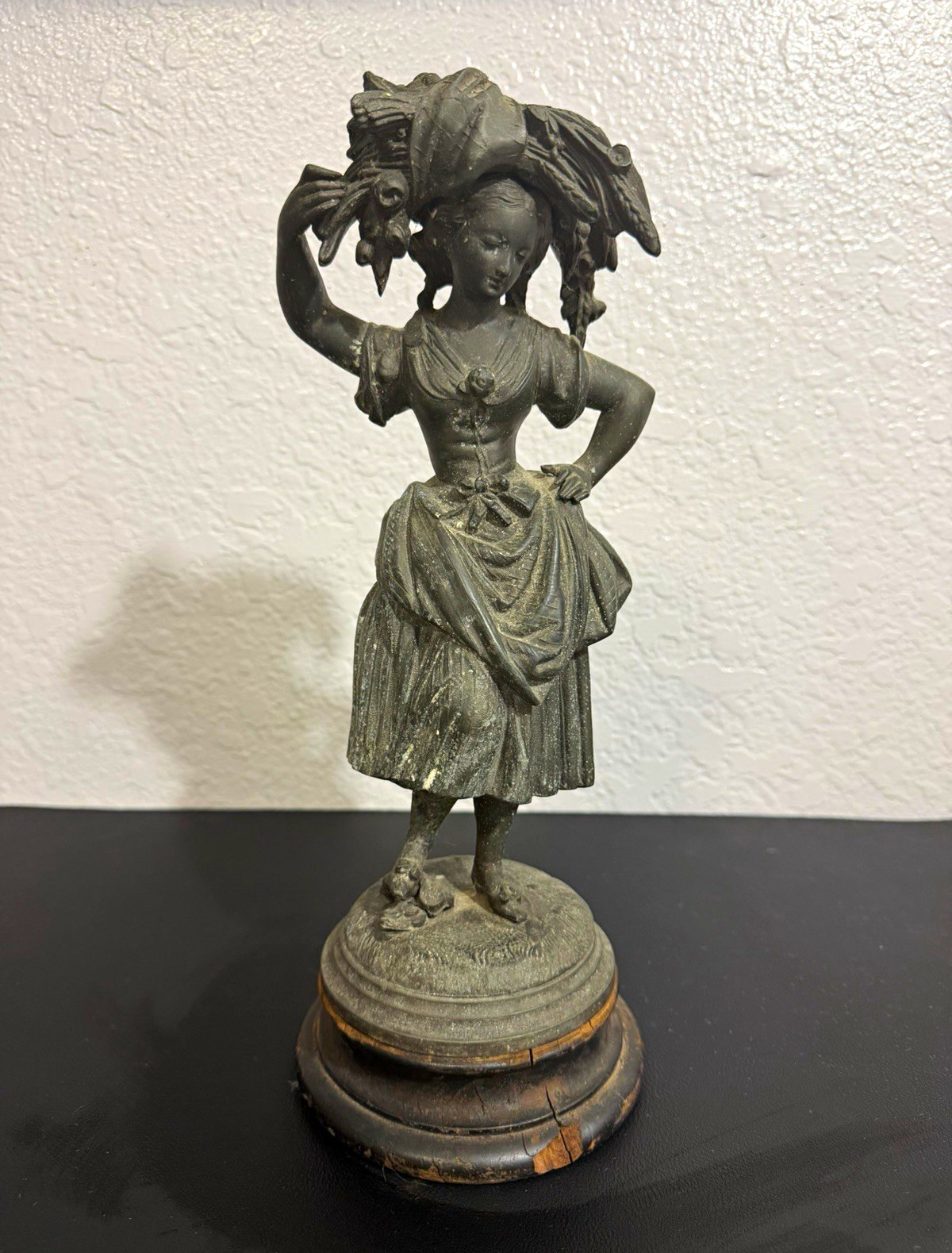 Antique Spelter Figurine with original wood spin base Antique Spelter Figurine with original wood spin base
