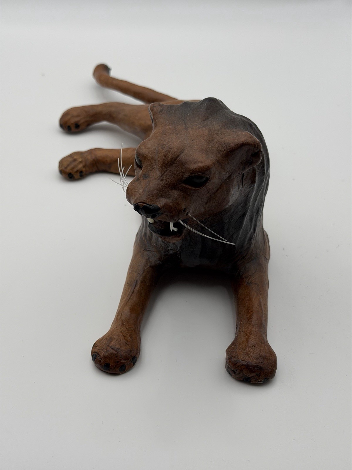 Vintage Mid-Century Leather Wrapped Reclining Lion Sculpture Vintage Mid-Century Leather Wrapped Reclining Lion Sculpture