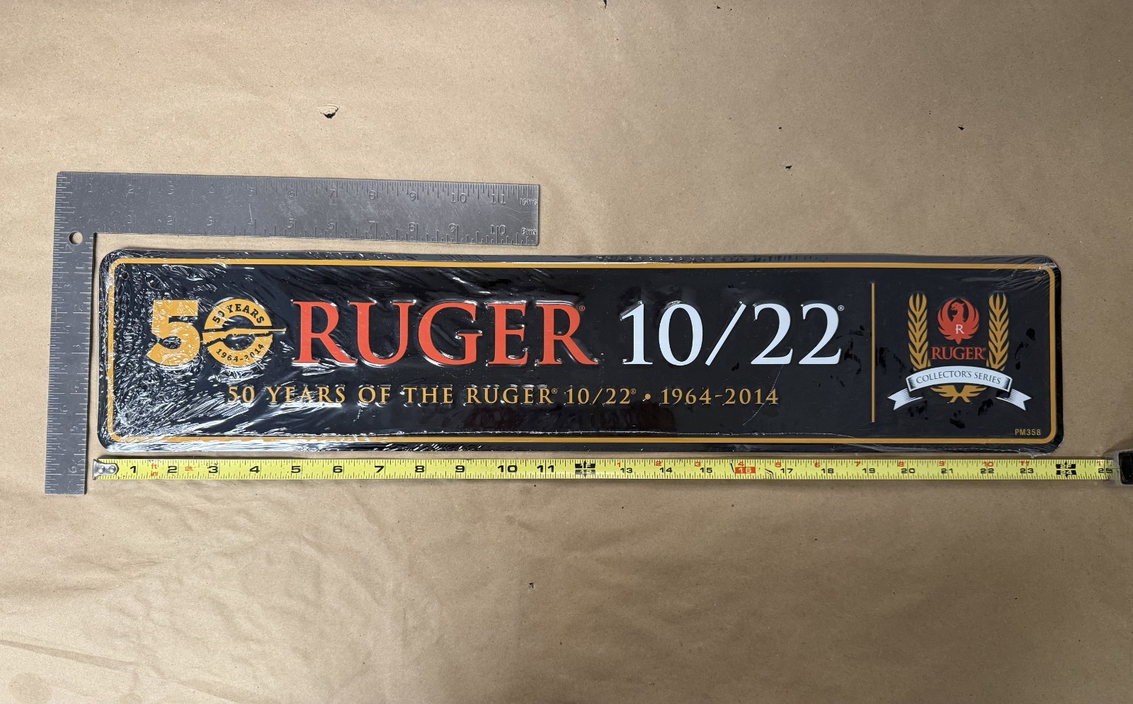 Ruger 10/22 50 Years 1964-2014 Anniversary Collector’s Series Embossed Tin Sign Ruger 10/22 50 Years 1964-2014 Anniversary Collector’s Series Embossed Tin Sign