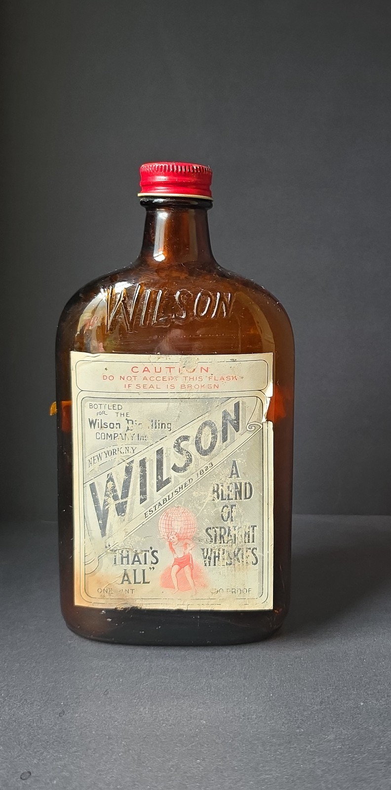 Vintage "That's All" Wilson Whiskey bottle from the 1940s - Amber Glass - Empty Vintage "That's All" Wilson Whiskey bottle from the 1940s - Amber Glass - Empty