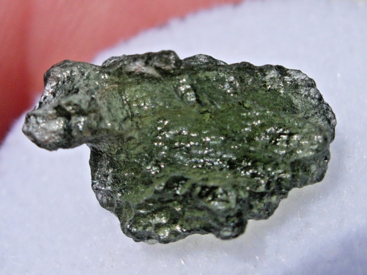 3.52 carats 14x8x7mm MOLDAVITE from Czech Republic from impact with a COA 3.52 carats 14x8x7mm MOLDAVITE from Czech Republic from impact with a COA