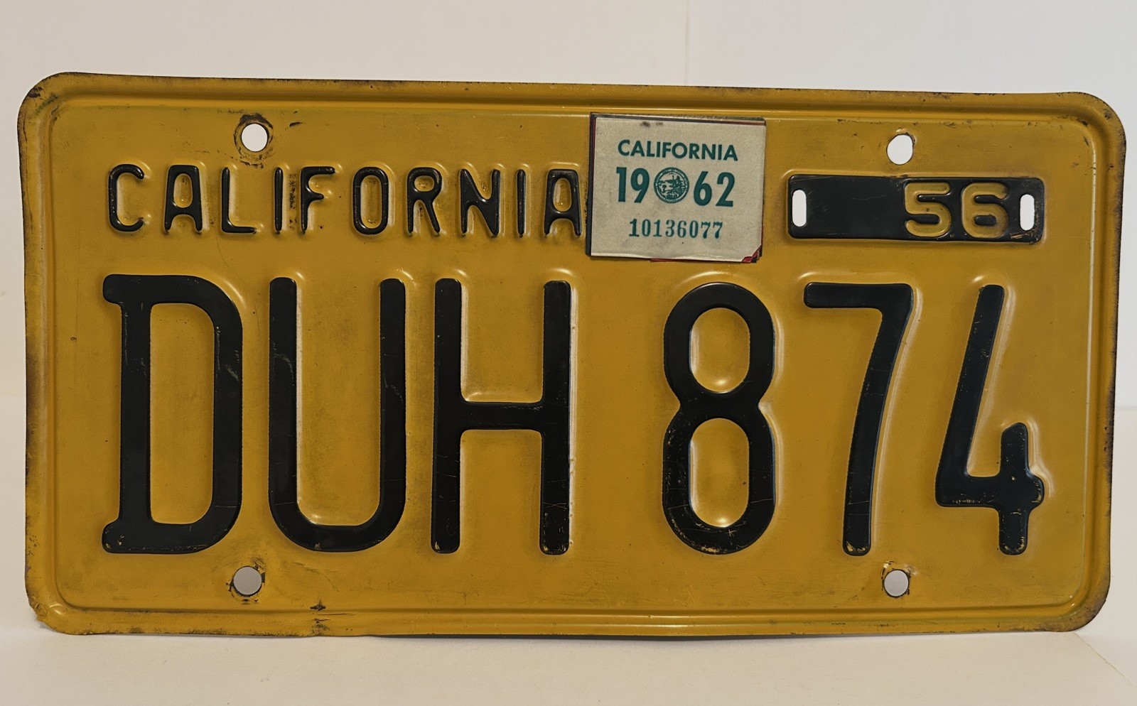 Vintage 1956 California "DUH 874" license plate, UNUSED Yellow Black Vintage 1956 California "DUH 874" license plate, UNUSED Yellow Black