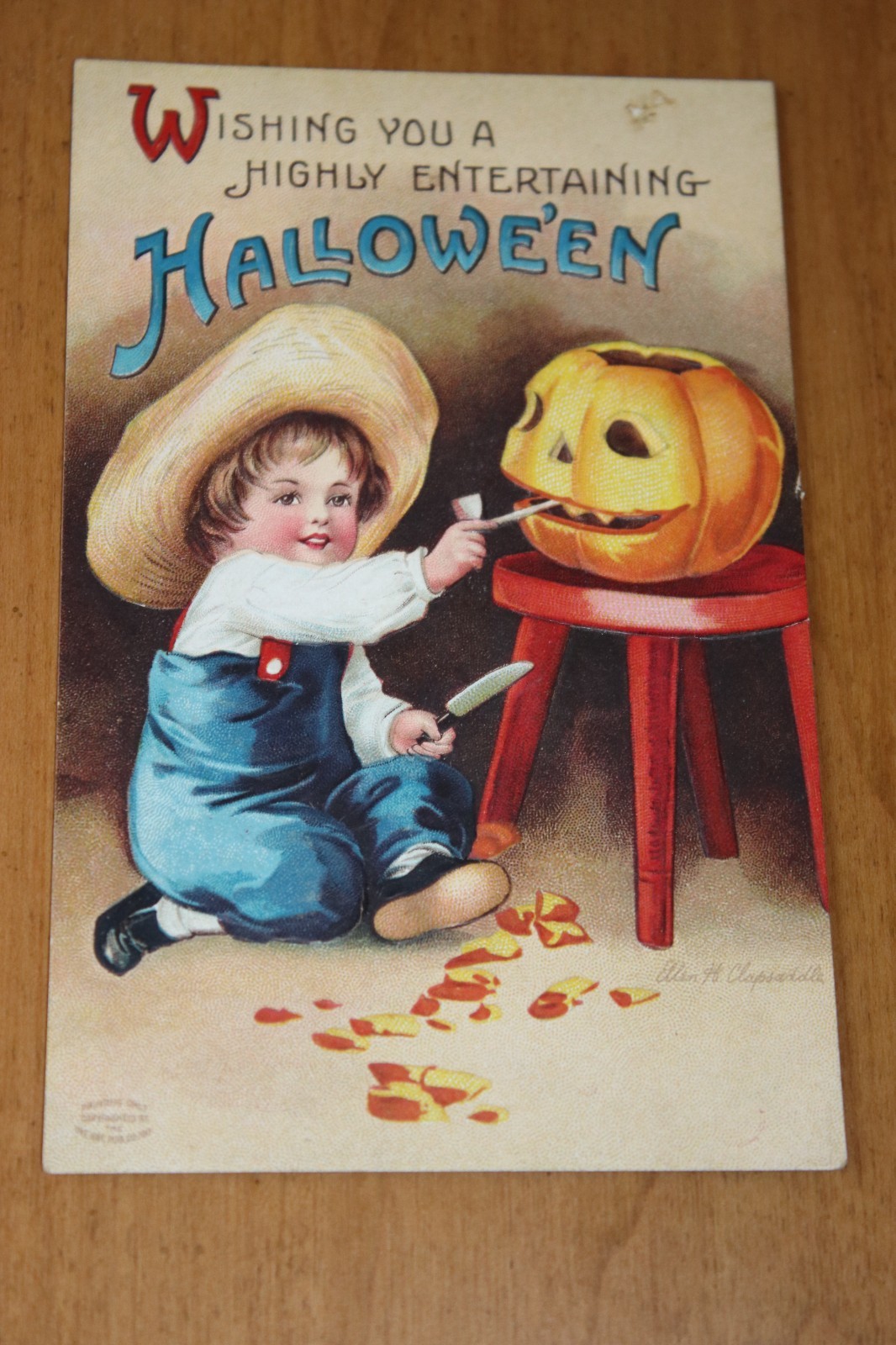 Antique Clapsaddle Halloween Postcard with boy carving a pumplin, Antique Clapsaddle Halloween Postcard with boy carving a pumplin,