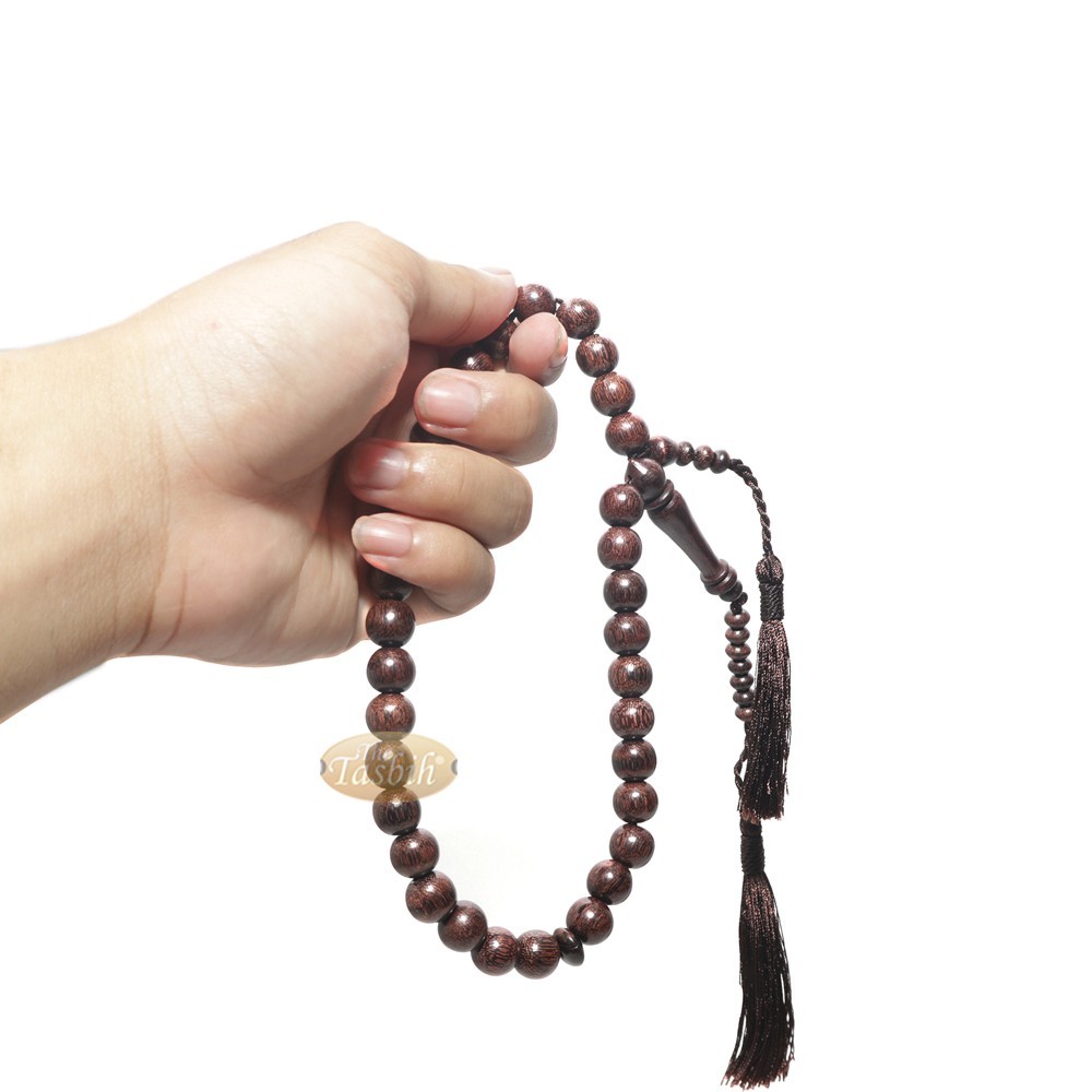 Muslim Tasbih Prayer Beads Made from Tamarind Wood with Brown Decorated Tassels Muslim Tasbih Prayer Beads Made from Tamarind Wood with Brown Decorated Tassels
