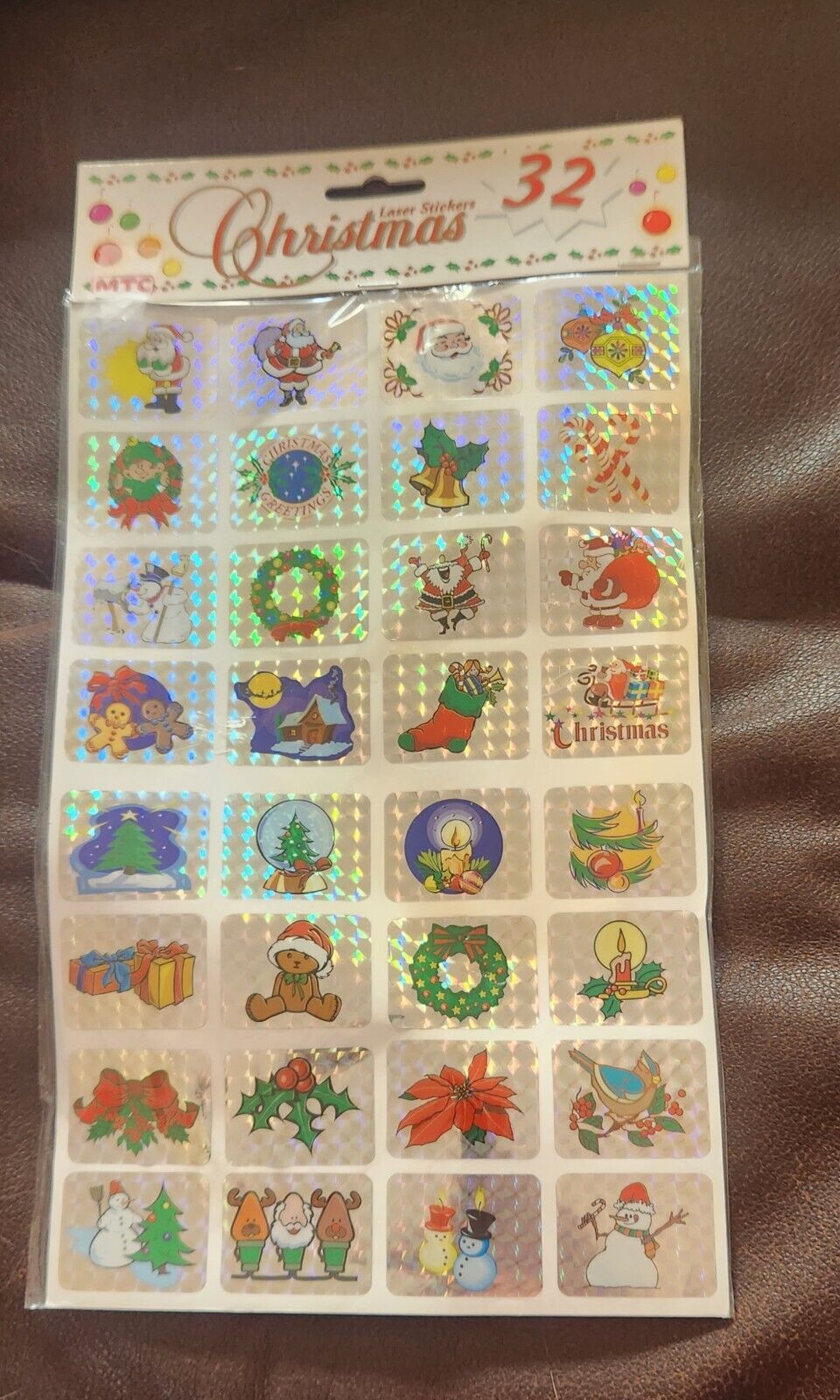Vintage prismatic laser stickers. Christmas/Seasonal themed. 32 total. New.