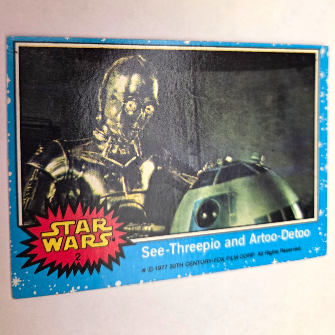 Topps 1977 Star Wars Card #2 See-Threepio and Artoo-Detoo C-3PO R2-D2
