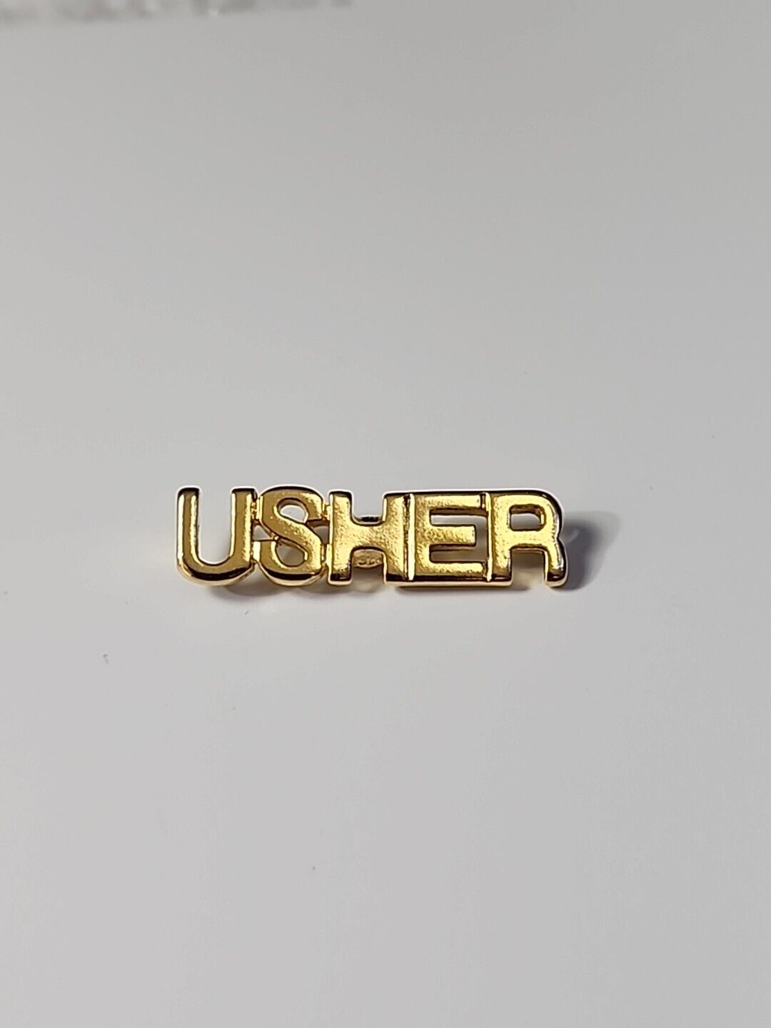 USHER Lapel Pin Gold Color Letters