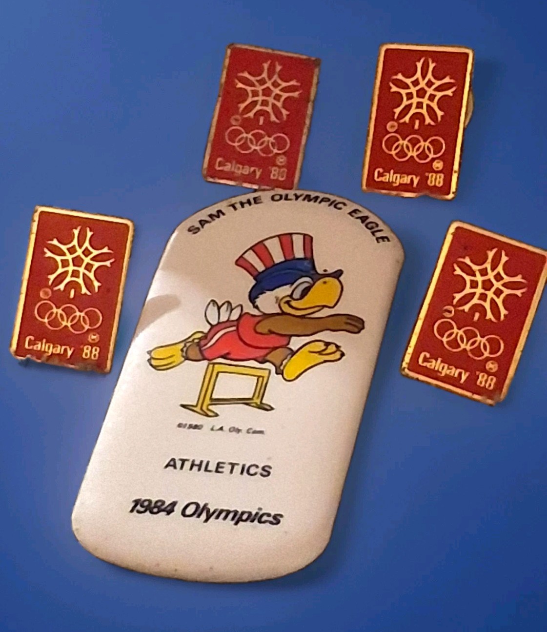 Vintage Olympics Calgary 88 Pinback Lot w/ 1984 Sam the Olympic Eagle Athletics Vintage Olympics Calgary 88 Pinback Lot w/ 1984 Sam the Olympic Eagle Athletics