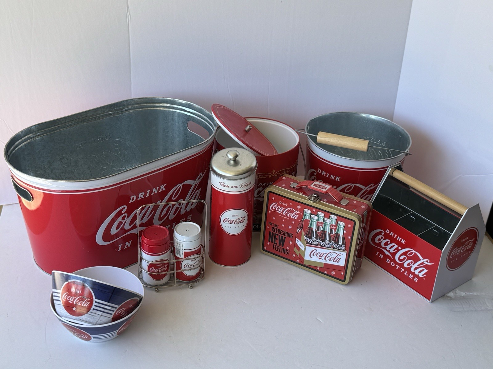 collection of vintage-style Coca-Cola branded kitchenware, novelty collectibles collection of vintage-style Coca-Cola branded kitchenware, novelty collectibles