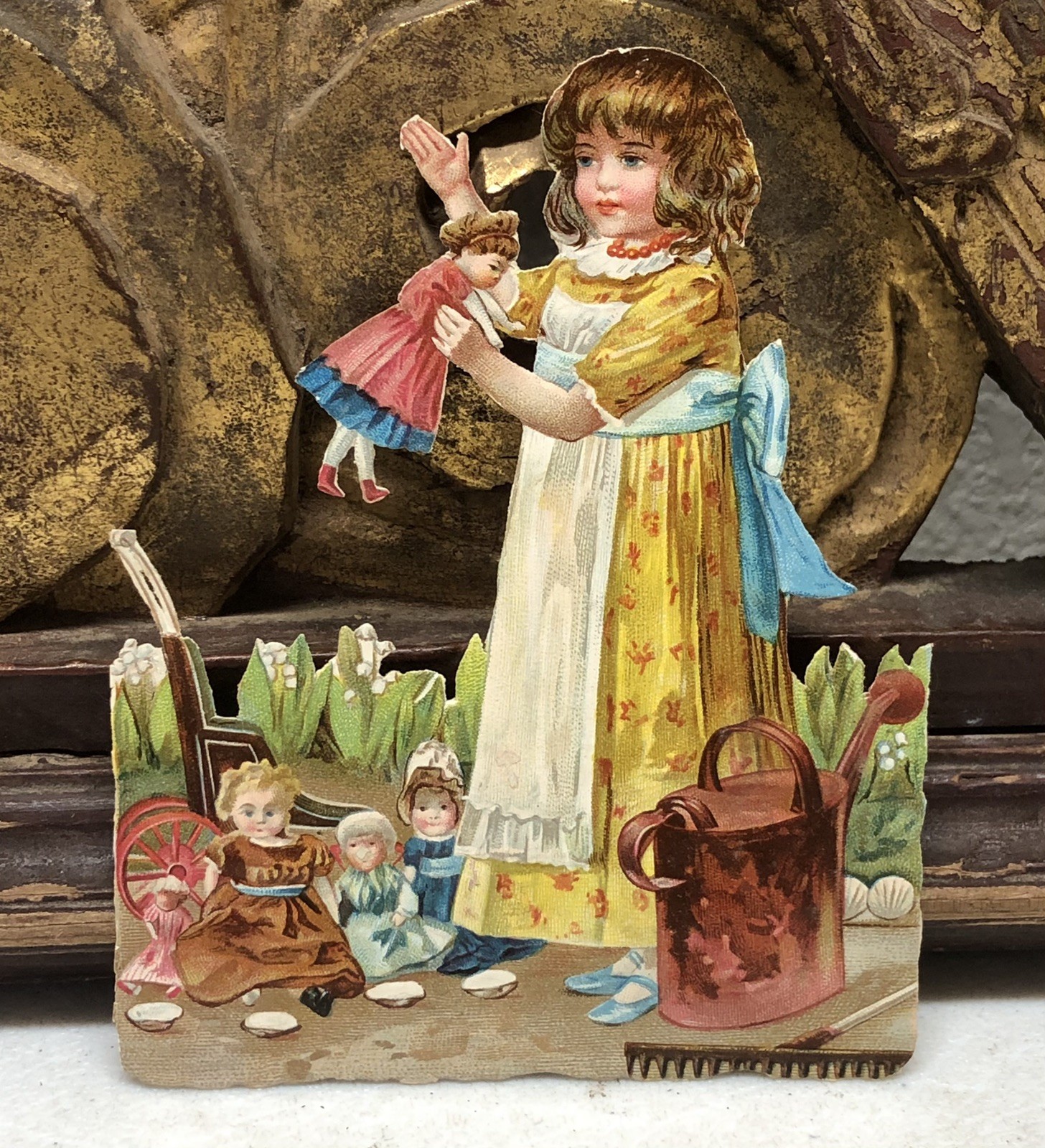 Victorian Die Cut Scrap of Girl in Dress w/ Dolls Flowers - L4 Victorian Die Cut Scrap of Girl in Dress w/ Dolls Flowers - L4
