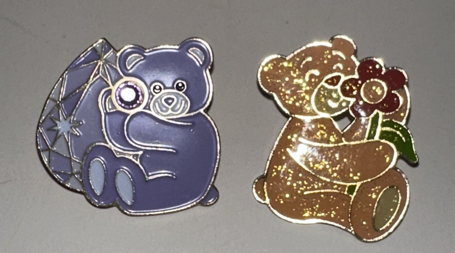 Lot of 2 VTG Build-a-Bear BAB Workshop Pins Purple with Stone and Orange Glitter Lot of 2 VTG Build-a-Bear BAB Workshop Pins Purple with Stone and Orange Glitter