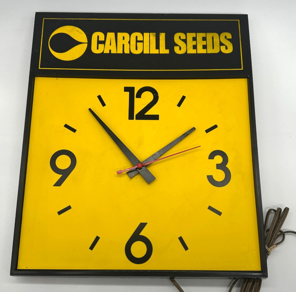 Vintage 1970s Cargill Seeds Black & Yellow Advertising Electric Wall Clock Works Vintage 1970s Cargill Seeds Black & Yellow Advertising Electric Wall Clock Works