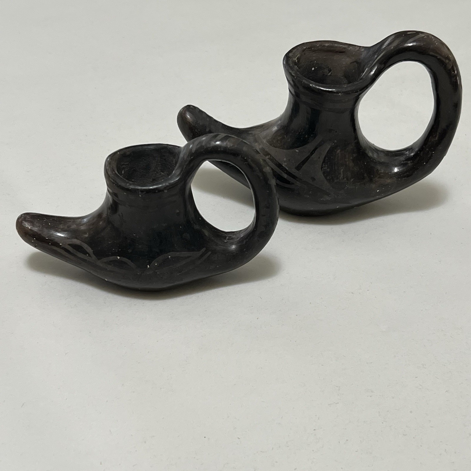 Santo Domingo Pottery Moccasin Candle Holders Black on black San Ildefonso ? Santo Domingo Pottery Moccasin Candle Holders Black on black San Ildefonso ?