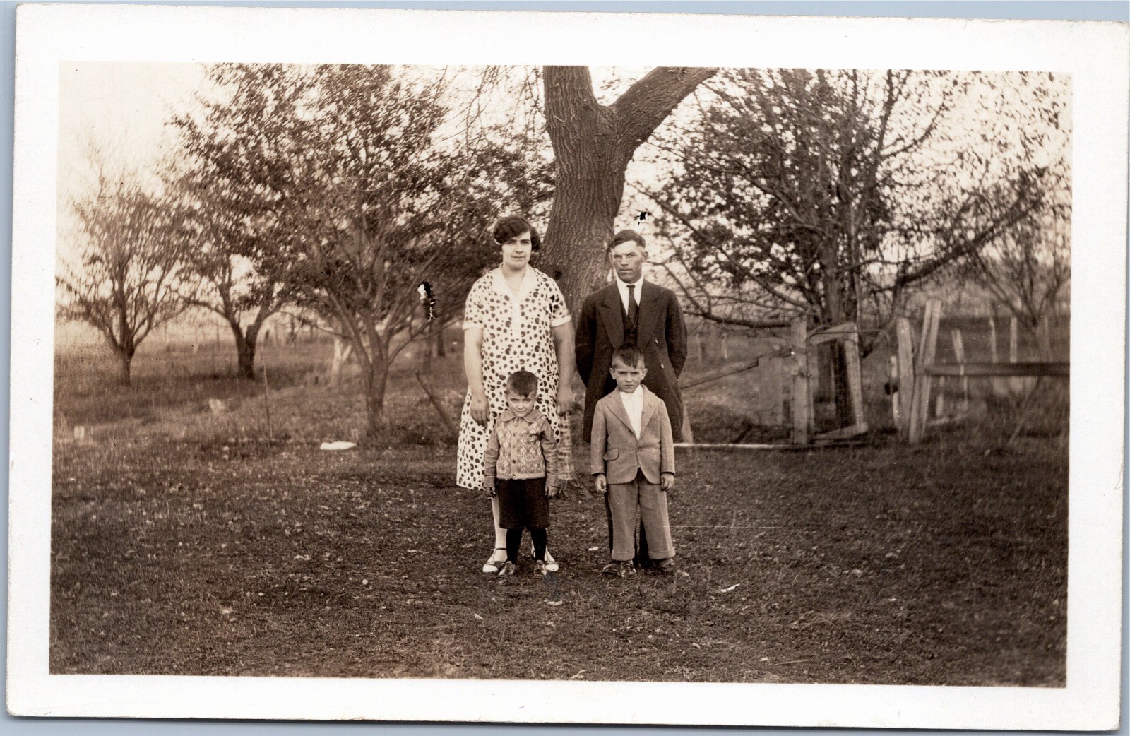 RPPC: Family in yard circa 1926-1940s RPPC: Family in yard circa 1926-1940s