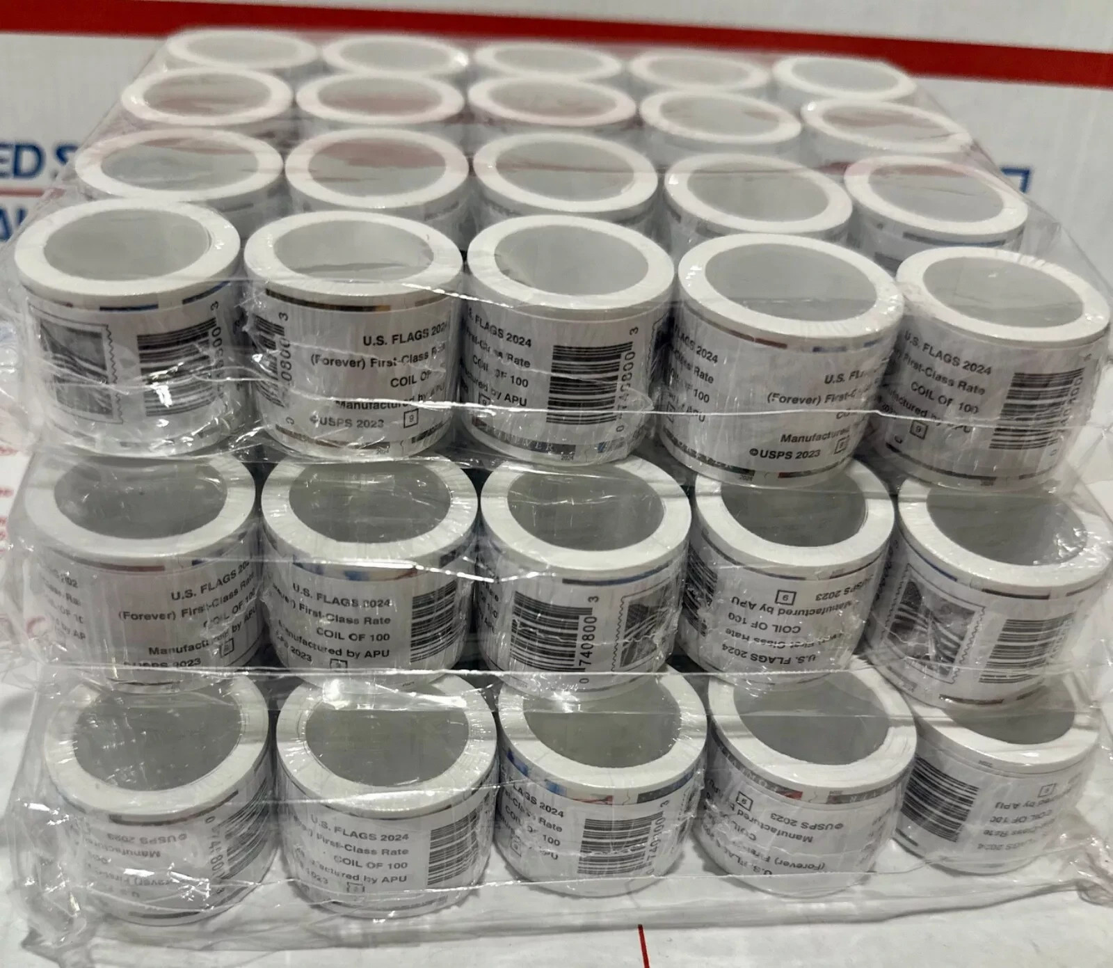 20 rolls of 100 USPS postage stamps, totaling 2000 pieces 20 rolls of 100 USPS postage stamps, totaling 2000 pieces