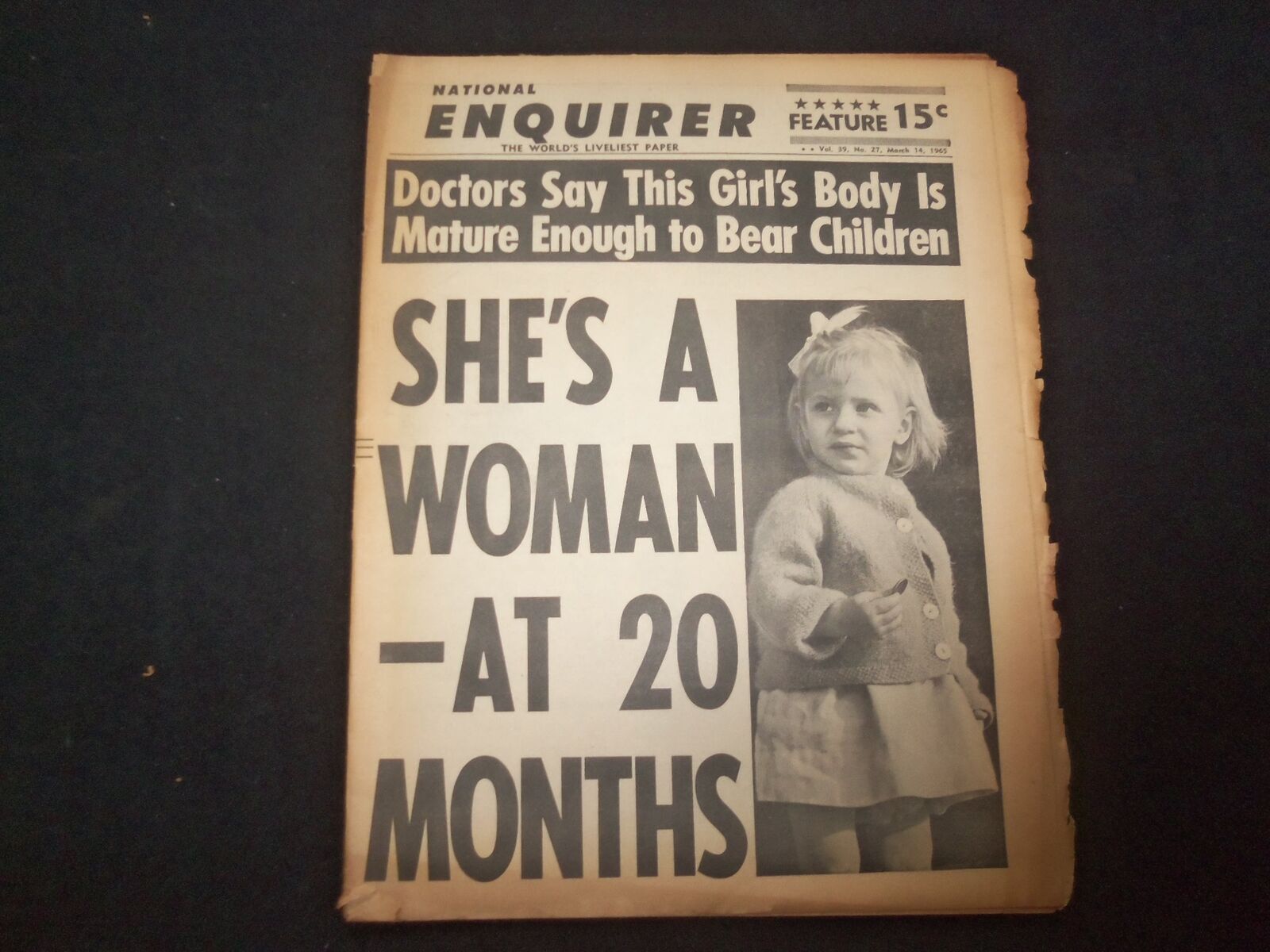 1965 MARCH 14 NATIONAL ENQUIRER NEWSPAPER - SHE'S A WOMAN AT 20 MONTHS - NP 7378