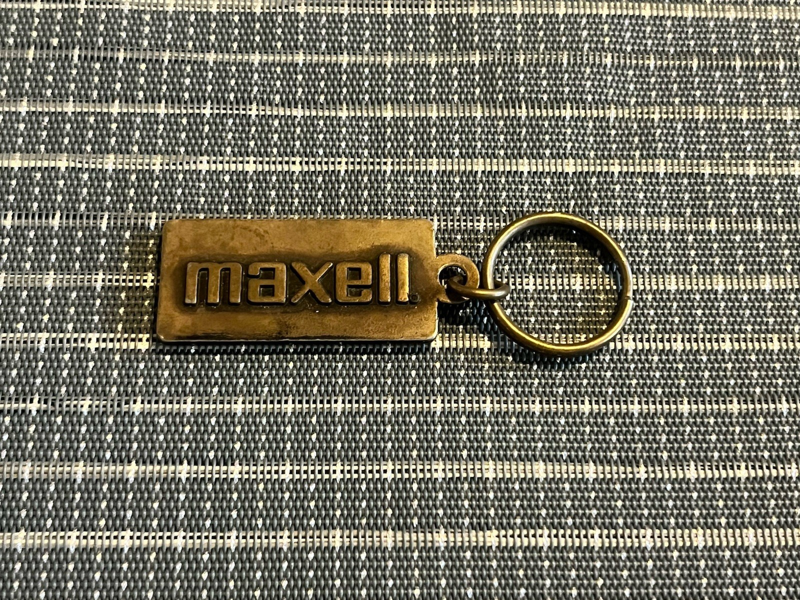 Vintage Maxell Blown Away Guy Logo Brass Keychain Vintage Maxell Blown Away Guy Logo Brass Keychain
