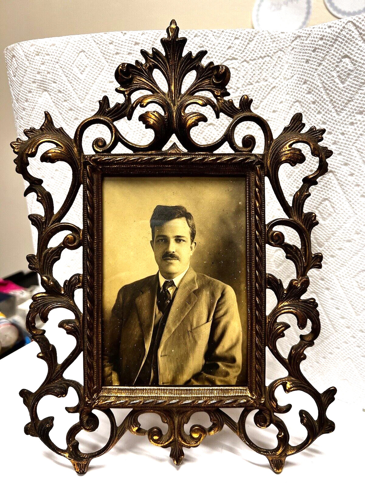 Antique Photo Frame Feathery Scrolls Standing 11 3/4" Tall Holds 5 1/8 x 3 5/8" Antique Photo Frame Feathery Scrolls Standing 11 3/4" Tall Holds 5 1/8 x 3 5/8"
