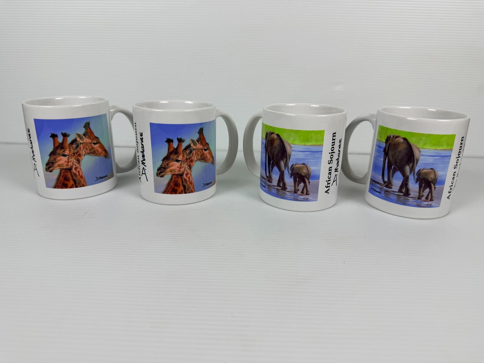 Set of 4 Custom Coffee Mugs African Sojourn by artist D. Madaras. Set of 4 Custom Coffee Mugs African Sojourn by artist D. Madaras.