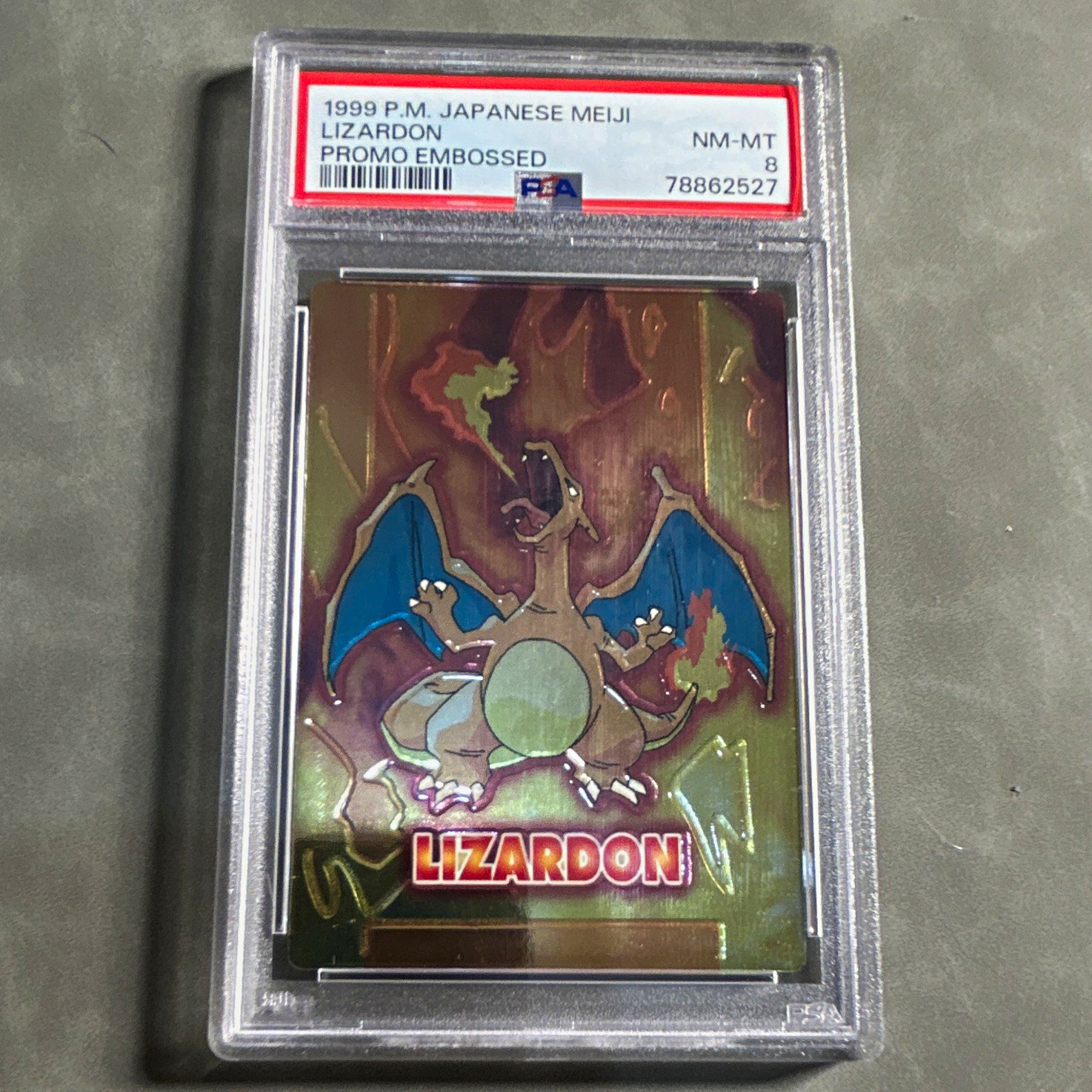 Meiji 1999 Japanese Meiji Lizardon Promo Embossed PSA 8 Pokemon Card Meiji 1999 Japanese Meiji Lizardon Promo Embossed PSA 8 Pokemon Card