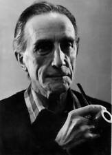 Closeup of French Dada artist Marcel Duchamp holding a pipe - 1965 Old Photo picture