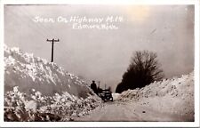Real Photo Postcard Snowy Scene on Highway M. 14 in Edmore, Michigan picture