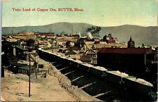VINTAGE POSTCARD TRAIN LOAD OF COPPER ORE RAIL DEPOT BUTTE MONTANA 1912 picture