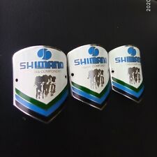 NOS 3X VINTAGE shimano BICYCLE HEAD BADGE BIKE emblem badge logo 1970 racing picture