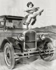 Vintage 1920s Photo - Ballerina Balancing on Front of 1927 Chevrolet Automobile picture