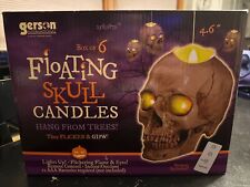 Gerson 2589870 Battery Operated Lighted Hanging Skulls with Remote Control picture