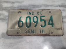 Vintage 1986 Indiana Semi Trailer License Plate 60954 Expired Green Text picture