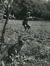 c. 1950 Maurice Baquet, Cellist, Hunting Rabbits Photo by Robert Doisneau picture
