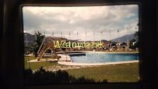 XXFU09 Vintage 35MM SLIDE POOL WITH HIGH DIVE, MOUNTAINS IN BACKGROUND picture
