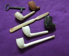 Lot of (7) privy dug smoking pipes / key / toothbrush picture