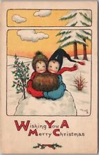 1914 MERRY CHRISTMAS Greetings Postcard Boy & Girl in Snow -Artist-Signed 