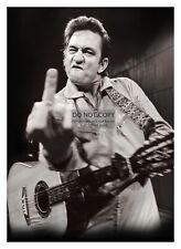 JOHHNY CASH FLIPPING THE BIRD TO THE CAMERA COUNTRY SINGER 5X7 PHOTO picture