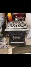 ANTIQUE WOOD BURNING STOVE CHROME ACCENTS / DOUBLE STAR PARLOR STOVE. picture