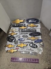 25 PIECE LOT OF CAR EMBLEMS - VARIOUS MAKES & MODELS - GM, FORD, Toyota + picture