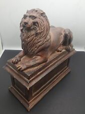 Lion Figure Lying On A Pedestal Sculpture picture