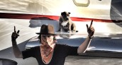 Alec Monopoly With His DOg on Private Jet