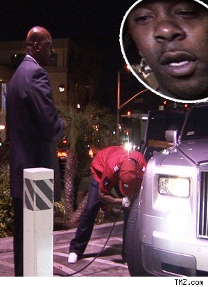 Busta Rhymes Filling The Tires in His Rolls Royce