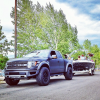 Ken Block Ford Raptor pulling boat